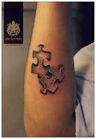 Autism Awareness Black And White Puzzle Piece Tattoo Jigsaw Puzzle Mom Dad Forearm Unique Love Conceptual Tattoo Leotattoos Matunga Mumbai India Puzzle Tattoos Couple Tattoos Unique Autism Tattoos