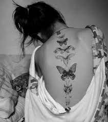 Foto Tatuaje De Mariposas En La Espalda Para Mujer Tattoos Girl Tattoos Spine Tattoos