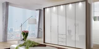 Here you'll find some great striped top s for spring, a really cute dress, a great black midi skirt and a few other pieces i threw in for styling. Contemporary Wardrobe Loft Wiemann Wooden With Swing Doors With Drawer