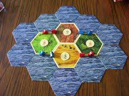 In catan (formerly the settlers of catan ), players try to be the dominant force on the island of catan by building settlements, cities, and roads. How Do You Make Settlers Of Catan Work Well For 2 Players Problems And Play Tested Solution Described Alternatives Requested Board Card Games Stack Exchange