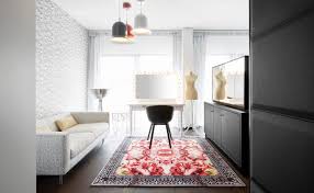 The grey, minimalist couch and the grey ottoman increase the tone. Six Exciting Interior Design Positions On Dezeen Jobs This Week