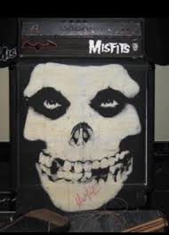 Doyle's custom cabinet w/signed Crimson Ghost speaker cover, custom head,  and Jerry's bass he beat the hell out of. : r/TheMisfits