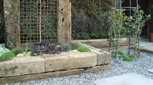 Alternatively, you can just dig a shallow rectangle hole on the ground and place the sleepers. Sleeper Edging Design Diy Inspiration Mitre 10
