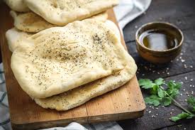 Like most leavened breads, this one consists primarily of flour, water and yeast. Flatbread Varieties From Around The World