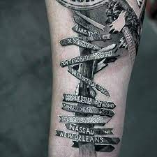 At tattoounlocked.com find thousands of tattoos categorized into thousands of categories. 30 Street Sign Tattoo Ideas For Men Navigational Designs Tattoos Street Signs Street Tattoo