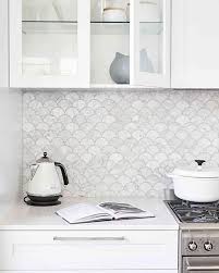 Moroccan Fish Scale Tile Or Mermaid Scale Tile Is A Decor Trend We Are Totally Obsesse Modern Kitchen Backsplash White Modern Kitchen White Kitchen Backsplash