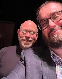 The OCU Wind Ensemble tour continues as Drs. @mhmailman and @tommy.dobbs  pause to pose and @ocu_alumni Daniel Hodge shares an OCU anecdote with his  siloamspringshs band students during today's visit!