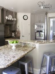 Santa cecilia gold granite falls into the gold range because of the various yellows and golds, however you will find blacks, browns, white, cream and even a sprinkling of claret or burgundy.the gold granite is less consistent because of the various colors and tones and brings a dramatic look to a bathroom or kitchen. Choosing My Battles And A Paint Color Shanty 2 Chic