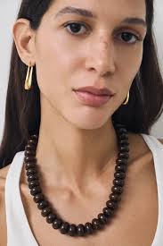 gold chain necklace with white crystal charms Starts