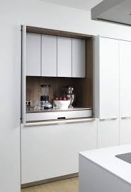 Disappearing Act 14 Minimalist Hidden Kitchens Remodelista Minimalist Kitchen Hidden Kitchen Kitchen Inspirations