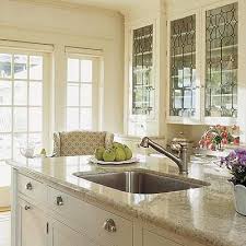 Low Contrast Between Granite Counters Cabinets And Wall Color Glass Front Upper Glass Kitchen Cabinets Glass Kitchen Cabinet Doors Off White Kitchen Cabinets