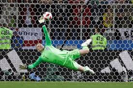 Jordan pickford is a professional soccer player known for having played for popular football clubs like sunderland afc, england national team, and everton. Jordan Pickford Makes A Big Save In The Penalty Shootout Abc News Australian Broadcasting Corporation