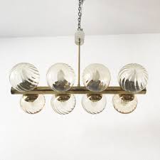 Back then, it was purely utilitarian; Mid Century Cluster Multi Globe Atomic Chandelier Lamp From Kaiser Leuchten For Sale At Pamono