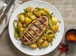 Pollo con patatas y pimientos