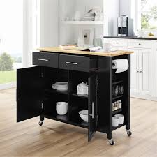 This kitchen island is equipped with 2 deep drawers, a sliding door cabinet with an adjustable shelf, and 2 towel bars. Crosley Savannah Wood Top Kitchen Island Cart In Black Cf3029na Bk