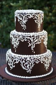 Chocolate Wedding Cake With Fancy White Scrolling White Chocolate Buttercream Frosting Desser Chocolate Wedding Cake Diy Wedding Cake Buttercream Wedding Cake