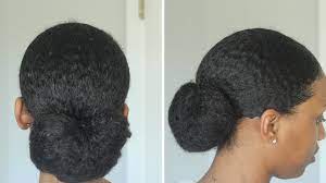 These faux shaved sides top knot bun with kanekalon hair is the quickest. My Sleek Low Bun Tutorial On Natural Hair Natural Hair Bun Styles Natural Hair Styles Natural Hair Braids