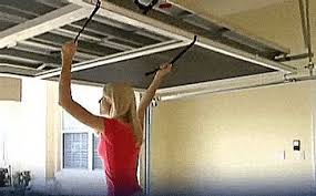 This Genius Rolling Mosquito Screen Attaches Right To Your Garage Door Track Garage Door Track Garage Screen Door Garage Doors