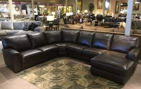 Corumba Brown 4 Piece Leather Sectional Adds Luxurious Seating For Your Living Room The Sleek Style Large House Furniture Shop Furniture Online Usa Furniture