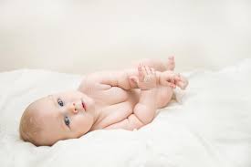 These simple ideas should provide just enough inspiration for you to plan and execute the perfect party for a friend or loved one who is expecting. Beautiful Smiling Cute Baby Girl With Blue Eyes Lying On The Back On The Bed In The Room Happy Child Laughing Stock Image Image Of Infant Human 103734685