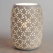 Crafted Of White Ceramic With A Cylindrical Silhouette Our Exclusive Table Lamp Features A Per Ceramic Table Lamps White Ceramic Lamps Table Lamps Living Room
