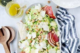 Shaved Brussels Sprout Salad With Pear Parmesan And Hazelnuts Recipe Brussel Sprout Salad Sprouts Salad Spring Recipes