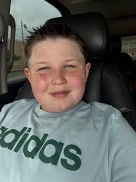 I love this photo of me and my little ones, but my baby isn't smiling.  Would someone be able to put the 2nd image of him smiling