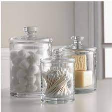 The good news is that small bathroom storage ideas do exist. You Could Easily Find Old Apothecary Jars At Antique Stores And Use Them For Easy Interesting Bathroom Stor Apartment Bathroom Glass Canisters Simple Bathroom