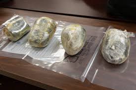 BROWN AND BLACK TAR HEROIN BUST Last week, @DFOLaredo CBP officers seized  $158,145 worth of brown and black tar heroin at Brownsville-Matamoros  International Bridge. The narcotics were discovered with the help of