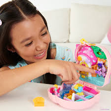 Capture the magic of playtime with Polly Pocket Compacts! From an  enchanting unicorn forest to tropical pool party, or even a cat-themed  restaurant, kids can play out endless stories of adventure and