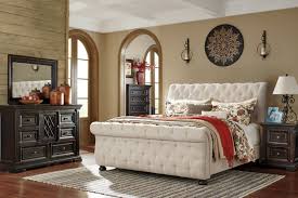 Get 5% in rewards with club o! Willenburg Queen Upholstered Sleigh Bed Ashley Furniture Homestore