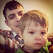 He just looks mad, but he's making faces at himself in the…