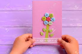 Greeting cards can be printed in a variety of sizes. Child Holds A Flower Card In His Hands Child Made A Greeting Card For Mom Or Dad Birthday Mothers Day Fathers Day Gift Idea How To Make Greeting Card Closeup Stock Photo