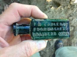 F M Cable Brainerd Minn bottle . This is one of my favorite bottles from  brainerd , This was dug in a backyard in town , Outhouse pit about 4 feet  down ,