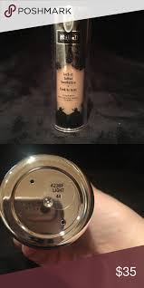 During my trip to seattle last week (full recap to come!), i managed to swatch every shade (with the exception of #56, which was mysteriously missing) of the kat von d lock it tattoo foundation. Kat Von D Lock It Tattoo Foundation In Light 44 Tattoo Foundation Kat Von D It Tattoo