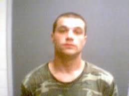 Four men arrested after leading officials