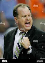 FILE ** LSU's head coach John Brady celebrates after their 76-67 overtime  victory over Tennessee during their Southeastern Conference basketball  tournament game at the Georgia Dome in Atlanta, in this March