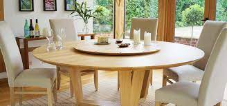 Our large wood lazy susan is available in all sizes up to 48 inches! Orbit Lazy Susan Round Dining Table Can Seat Up To 14 People Circular Dining Table Large Round Dining Table Round Dining