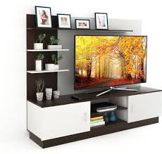 Entertainment centers go in your living room, bedroom or den and hold a variety of household items. Tv Stand Buy Corner Tv Stand Online At Best Prices In India Flipkart Com