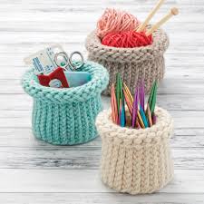 The knit stitch basket pattern provides easy instructions for crocheting a simple, chic, and functional basket featuring the knit stitch! Knitted Nesting Baskets