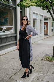 One Jumpsuit Two Ways For Fall Marled Gray Cardigan Fall Layering All Jumpsuit With Cardigan Black Jumpsuit With Cardigan Jumpsuit Outfit With Cardigan