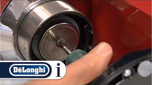 The automatic cleaning, descaling and rinsing programmes will ensure utmost hygiene after each use of your coffee machine. How To Clean The Coffee Outlet Of Your De Longhi Pump Espresso Coffee Machine Youtube