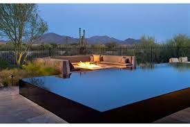 A Four Sided Negative Edge Pool And Firepit The Rein Model By K Small Backyard Pools Raised Pools Backyard Pool