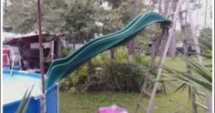 It is fun for family and friends, take a cool slide into your backyard pool and enjoy your summer. Merica Thechive Above Ground Pool Slide Pool Slide Diy Pool Ladder