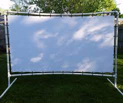 You can make a projector screen yourself. Backyard Movie Screen 9 Steps With Pictures Instructables