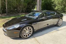 Image result for Marron Black 2021 Aston Martin