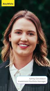 Ashley Donaldson from Ray White, The Bayside Group speaking