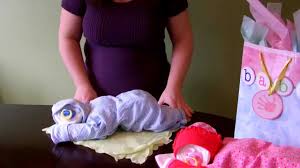 Diapers, or nappies, are mostly made of a combination of plastic and cotton. How To Make A Diaper Baby Sleeping Baby Boy Diaper Cake Youtube