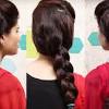 The beehive is a hairstyle in which long hair is piled up in a conical shape on the top of the head and slightly backwards pointing, giving some resemblance to the shape of a traditional beehive. 1