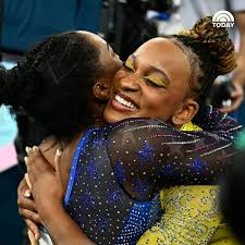 Congratulations over and over again @simonebiles!!!! The face of a  champion🥇🐐👏🏿❤️🇺🇲......And a heartfelt congrats to @rebecarandrade  🇧🇷❤️ AND @sunisalee 🇺🇲❤️